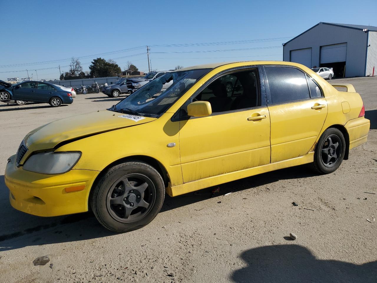 MITSUBISHI LANCER OZ 2003
