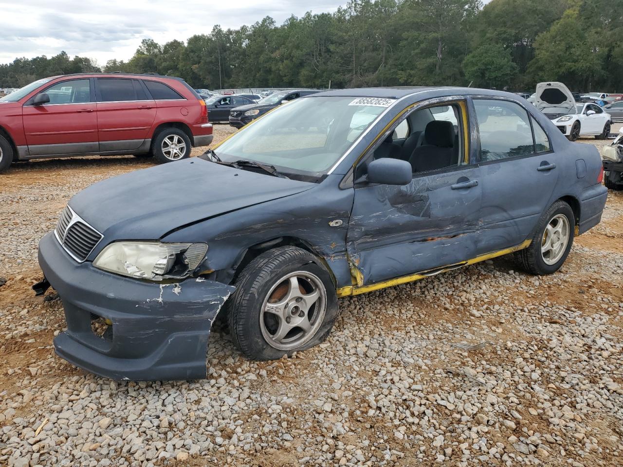 MITSUBISHI LANCER OZ 2003