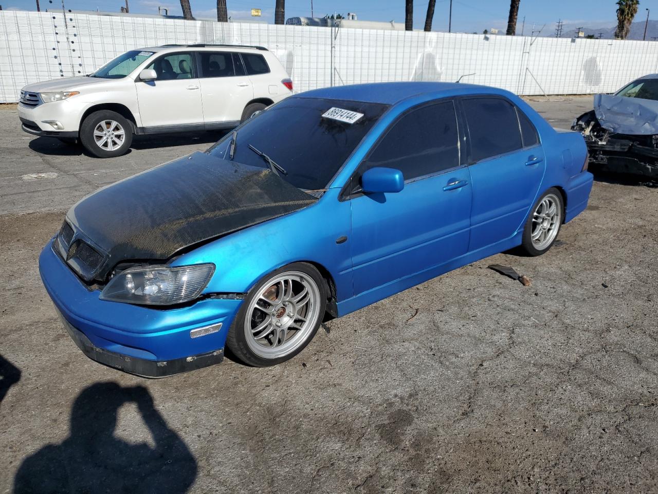 MITSUBISHI LANCER OZ 2002