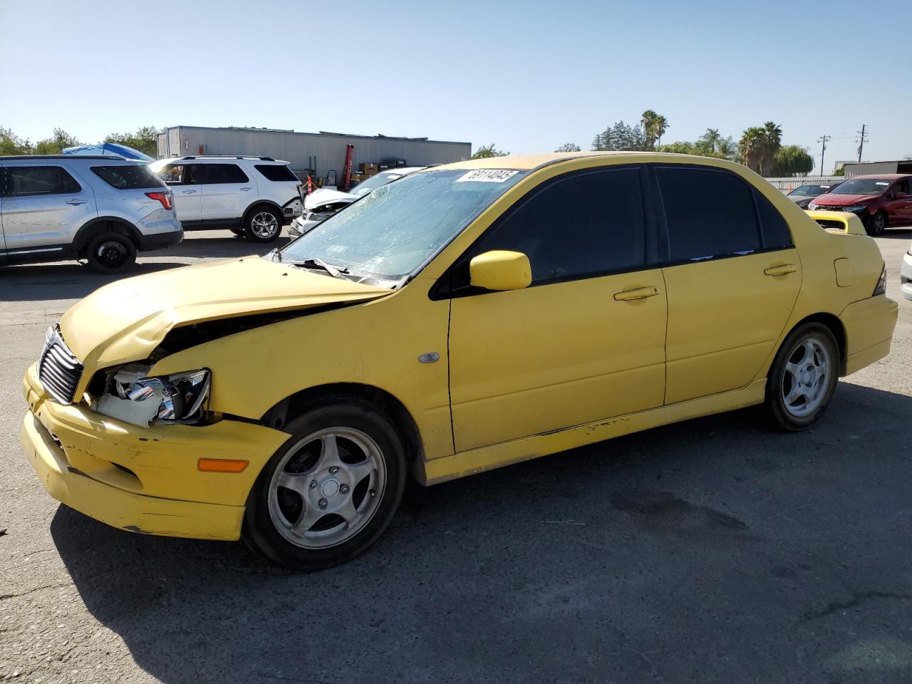 MITSUBISHI LANCER OZ 2002